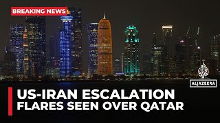 Explosions, flares over Qatar’s capital amid threat of attack on US bases