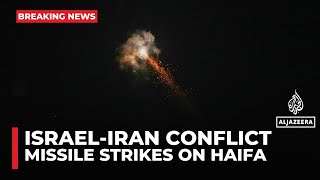 Iranian missile makes impact in Israel's city of Haifa