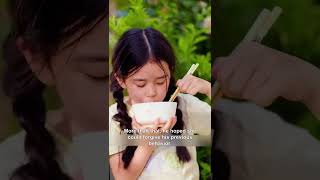 Each day, the boy left rice on the wall, hoping the girl next door would steal a bite.