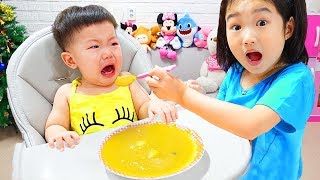 Boram take care of baby and play with color stacking rings