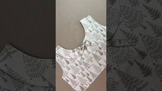 Processing the neckline of a blouse or dress #sewing