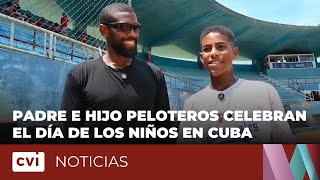 Padre e hijo peloteros celebran el Día de los niños en Cuba
