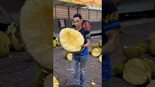Giant jackfruit sliced with skill. 🔪